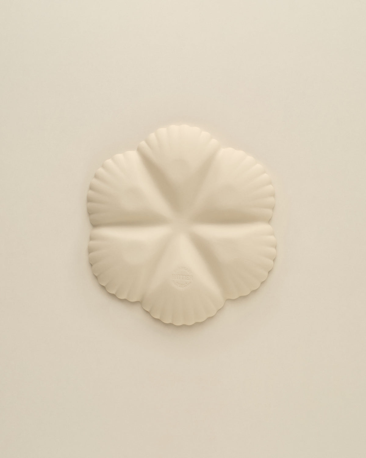 Underside of the Natural White Half Dozen oyster plate, matte unglazed porcelain