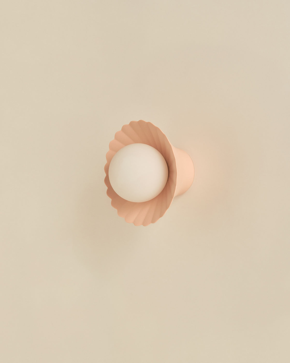 Daisy Wall Sconce in Whispery Pink, side view