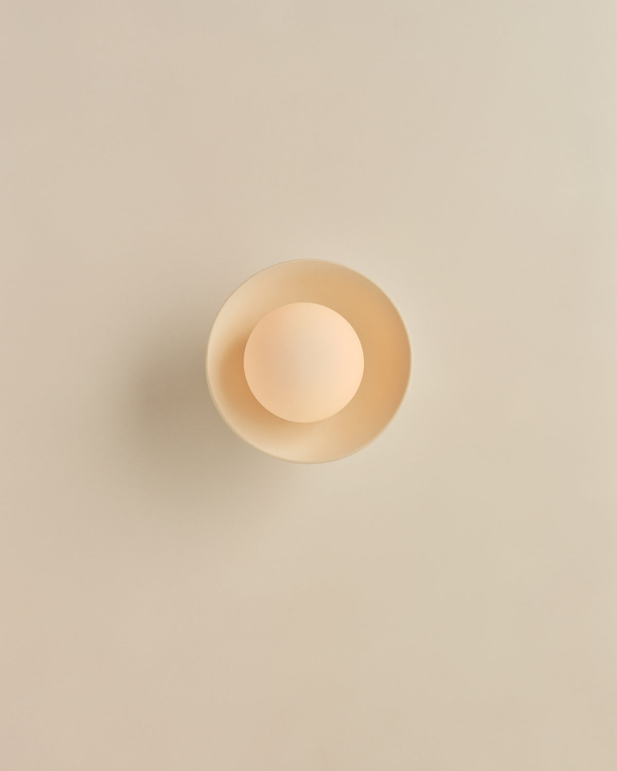 Pixie Wall Sconce in Natural White, lit