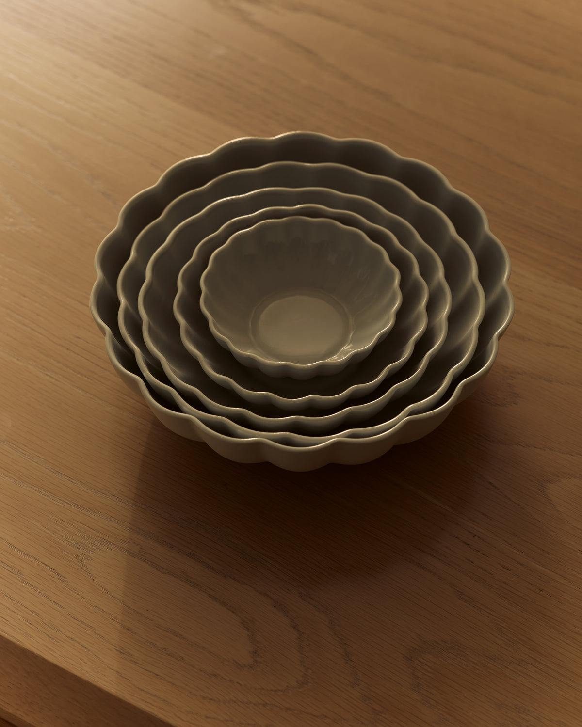 Fern Nesting Bowls, Complete Set of 5 in Light Blue Grey. Photograph by Lillie Thompson, styled by Emma Sandral