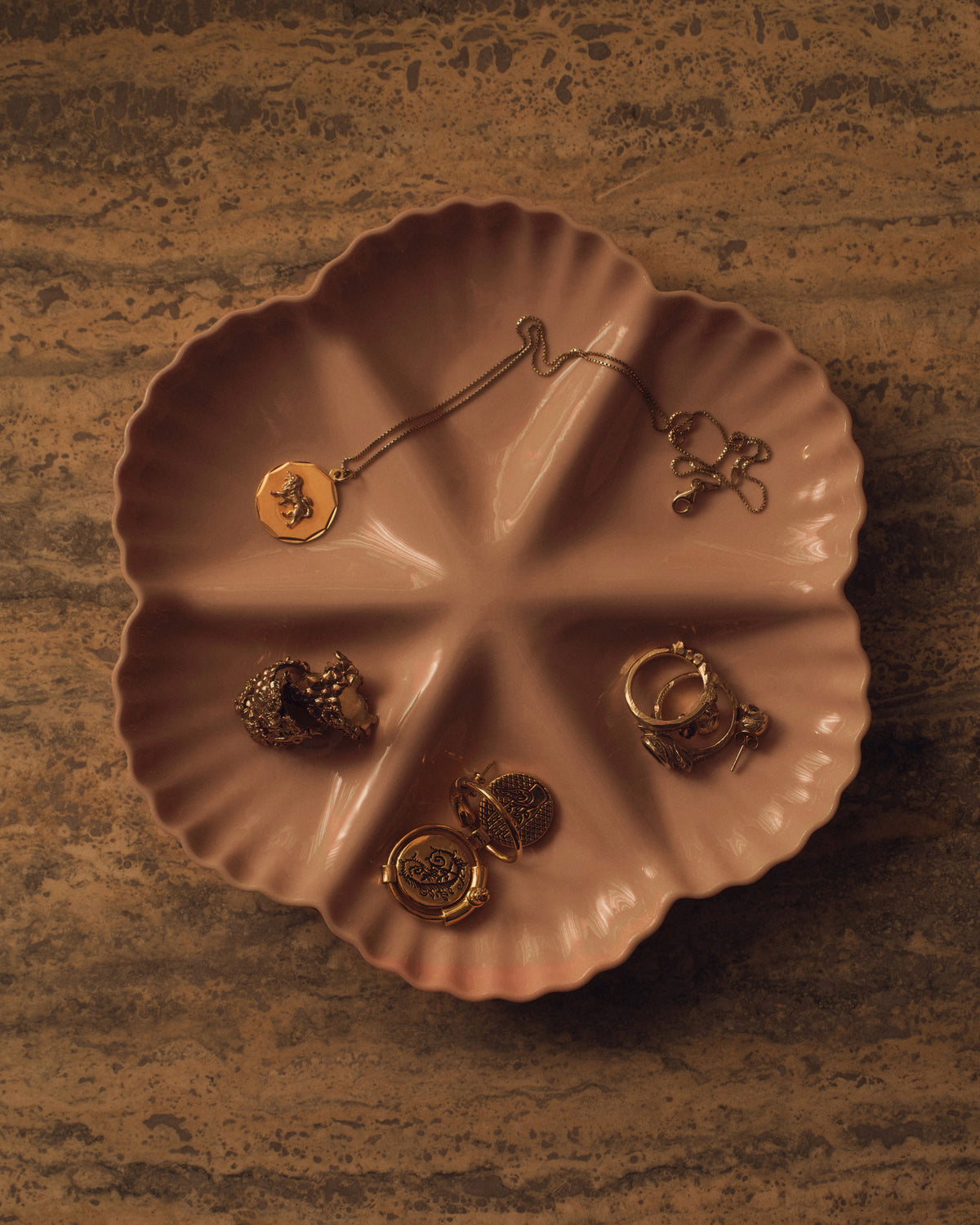 Mother of Pearl Oyster Plate, Half Dozen, in Whispery Pink with oysters. Photograph by Sarah Forgie